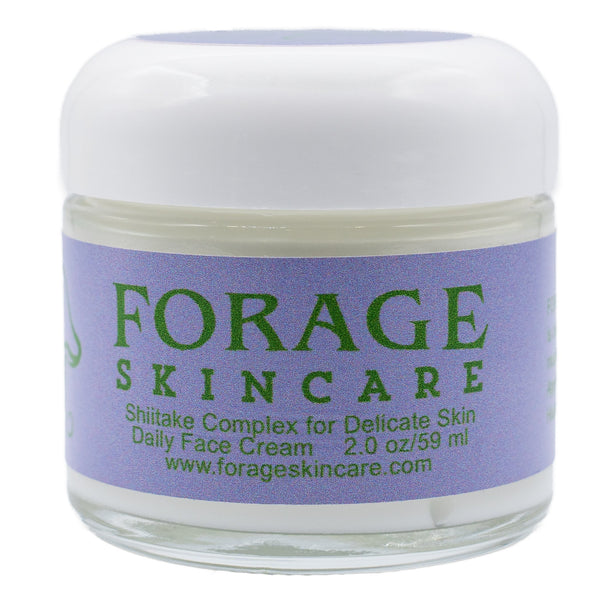 Skincare jar labeled 'Forage Skincare' on a white background