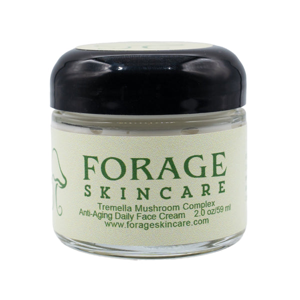 Forage Skincare jar with black lid on a white background
