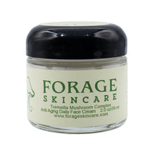 Load image into Gallery viewer, Forage Skincare jar with black lid on a white background